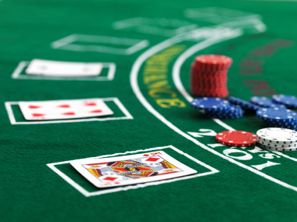 Blackjack Table with cards and poker chips on the table