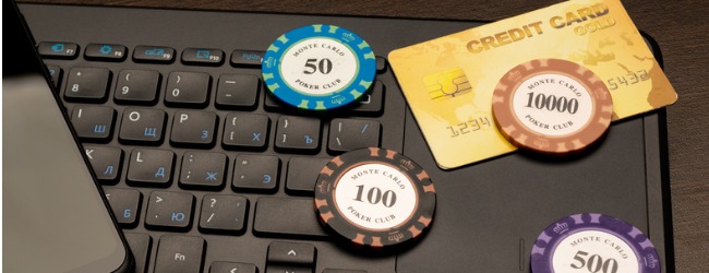 Casino chips on a keyboard