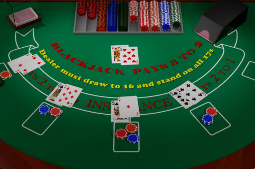 Image of a poker table with chips on the top whilst cards have been distributed in different places.