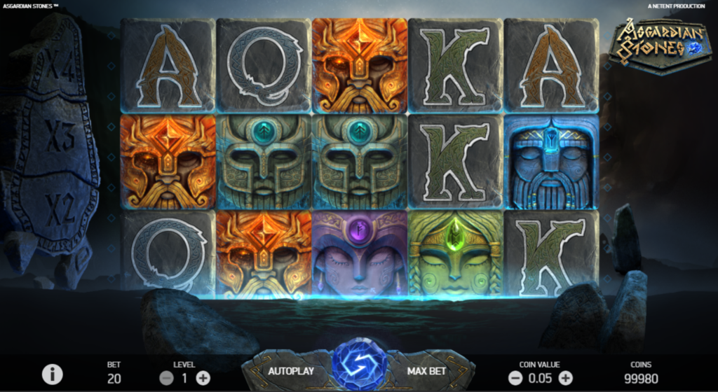 an image of the NetEnt slots game Asgardian stones. The slots consist of letters such as A,Q,K or images of the Norse Gods. 